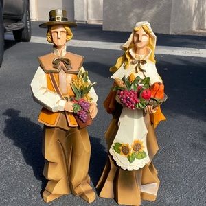Pacific rim pilgrims pair.  Wood
